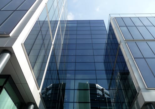 A modern glass building in central London.