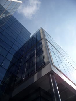 A modern glass building in central London.