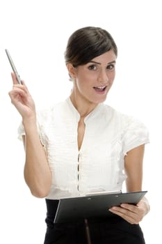 posing lady with pen and writing pad on an isolated background