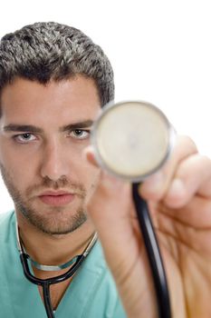 doctor showing stethoscope against white background