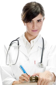 beautiful doctor posing with writing pad and pen on an isolated background