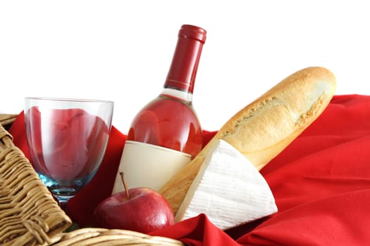 closeup on picnic basket food and wine