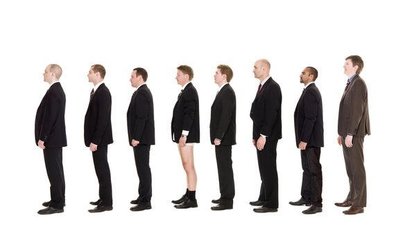 Man without pants standing on a line with other men