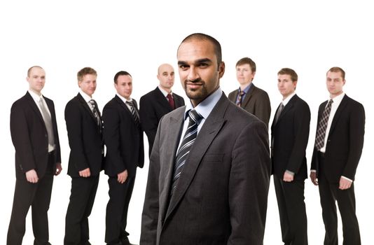 Business Manager in front of his team isolated on white background