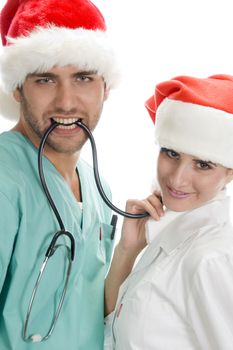 posing medicals professional with stethoscope on an isolated background