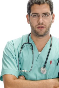 serious doctor with crossed arms on an isolated background