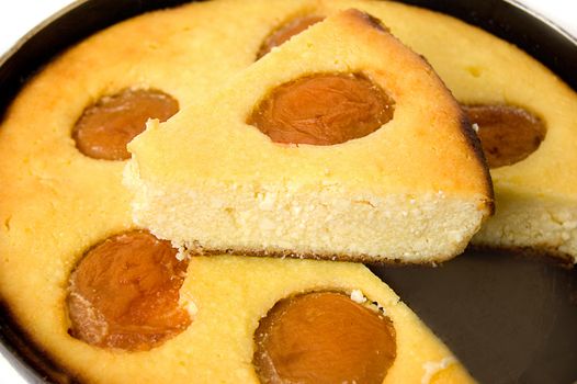 Baked pudding with apricot on frying pan