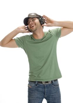 smiling man enjoying music on an isolated background