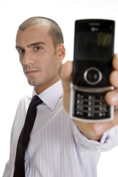 businessman holding mobile against white background