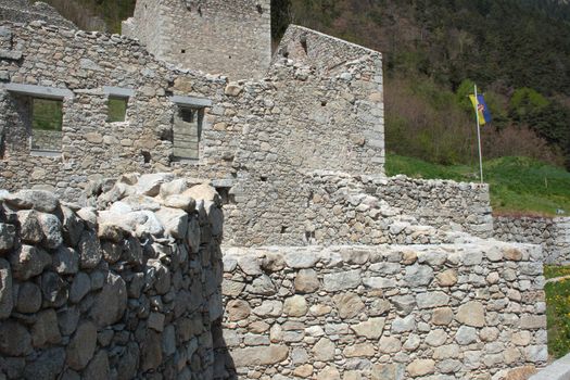 very old fortress and church located on the alpes