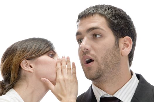 man and woman whispering sweet secrets isolated on white background