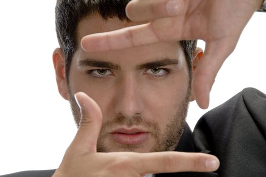 man showing framing hand gesture on an isolated background