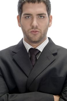 businessman with folded hands looking to camera on an isolated white background