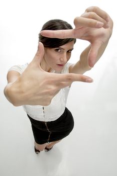 lady showing framing hand gesture on an isolated background