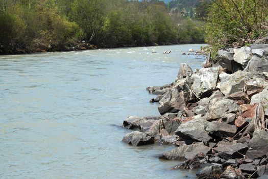 mountain river in the Alps during the spring