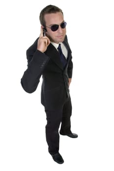 businessman with bluetooth and sunglasses on an isolated white background