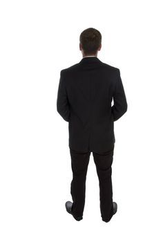 standing businessman posing from back on an isolated white background