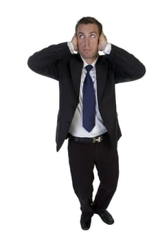 full pose of businessman putting hands on his ears with white background