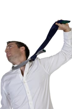 businessman hanging himself to his tie with white background