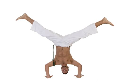 young caucasian doing cartwheel against white background