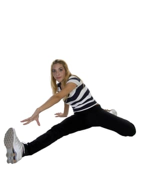 pretty young lady exercising on an isolated white background