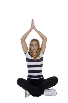 young woman in yoga pose against white background