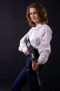 woman on black submachine gun
