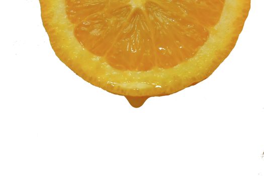 Orange juice drop from cut orange fruit