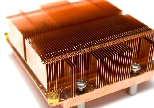 Radiator of a computer cooler on the processor. Isolation on a white background. Shallow DOF