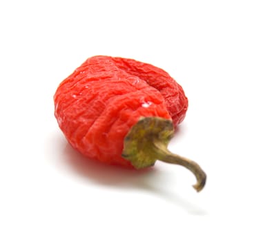 Red pepper on a white background. Isolation, shallow DOF