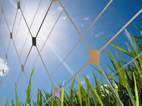 Closeup of a photovoltaic solar cell with sun glare and a fresh field of green grass