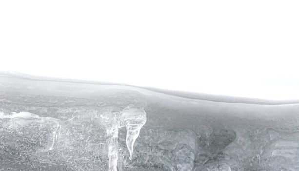  Ice stalactites on the side of a roof