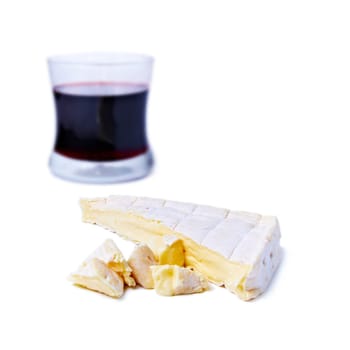 Brie cheese and gas of red wine isolated on white