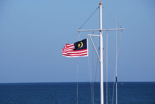 Malaysian flag blowing in the wind