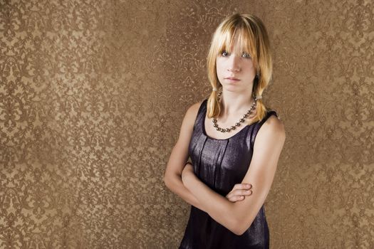 Blonde teenager ina sparkly party dress