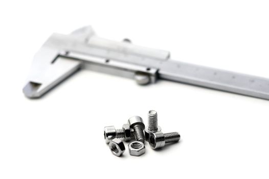 caliper and bolts on white background