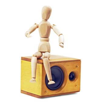 wood mannequin sitting on a speaker isolated on white background