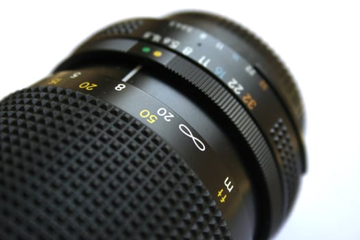 Close up on an analog camera lens.