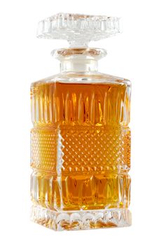 Crystal decanter with whiskey isolated on white