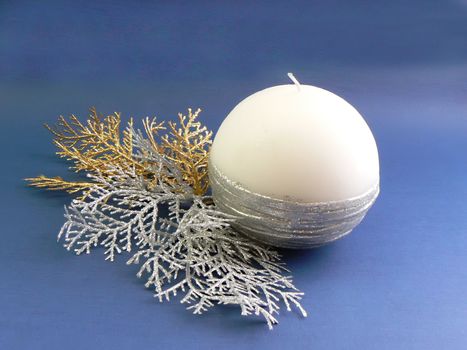 christmas candle with silver and gold branches