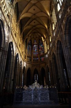 Interior of St Vitus cathedral - middle aisle, pointed vault, choir.
Prague, Czech republic, Europe.