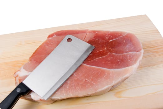 Chopping of meaton wooden board .cutlass and fresh  pork