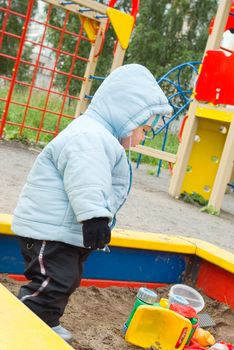 Boy Playing at the Playground