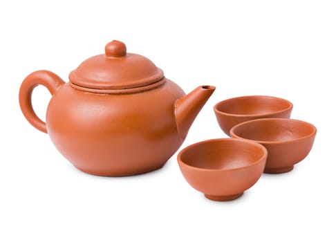 Ceramic ancient oriental teapot and three cups on a white background