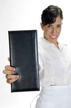 attractive waitress showing bill book in hand