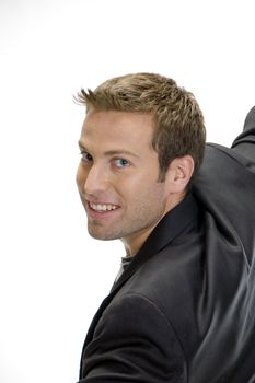 portrait of young male model looking back at camera