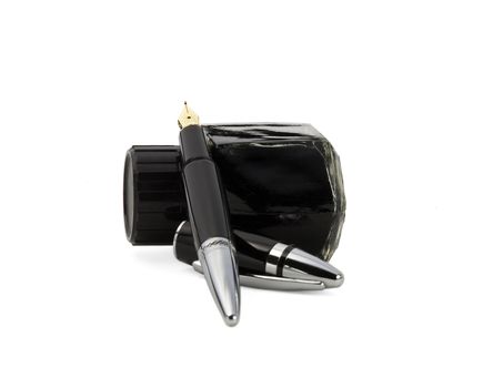 fountain pen and black ink bottle isolated on white background