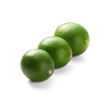 green fresh lime isolated over white background