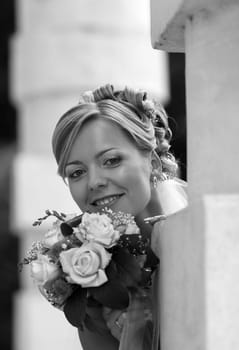 Portrait of the beautiful bride with a bouquet