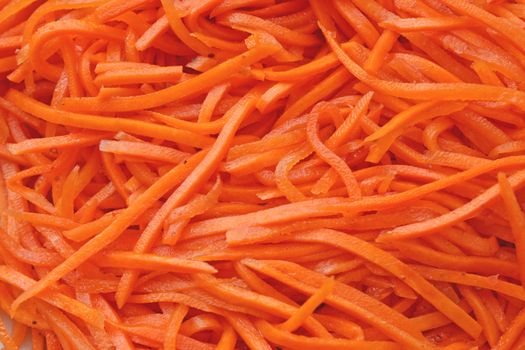 Close up of the spiced carrot. Long slices.